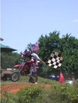 Kyle Smith taking the checkered flag 1st at Burleson
